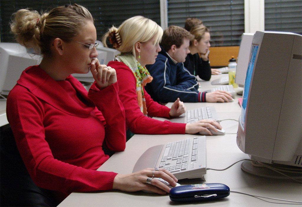 Adult learning theory adults sitting at computers